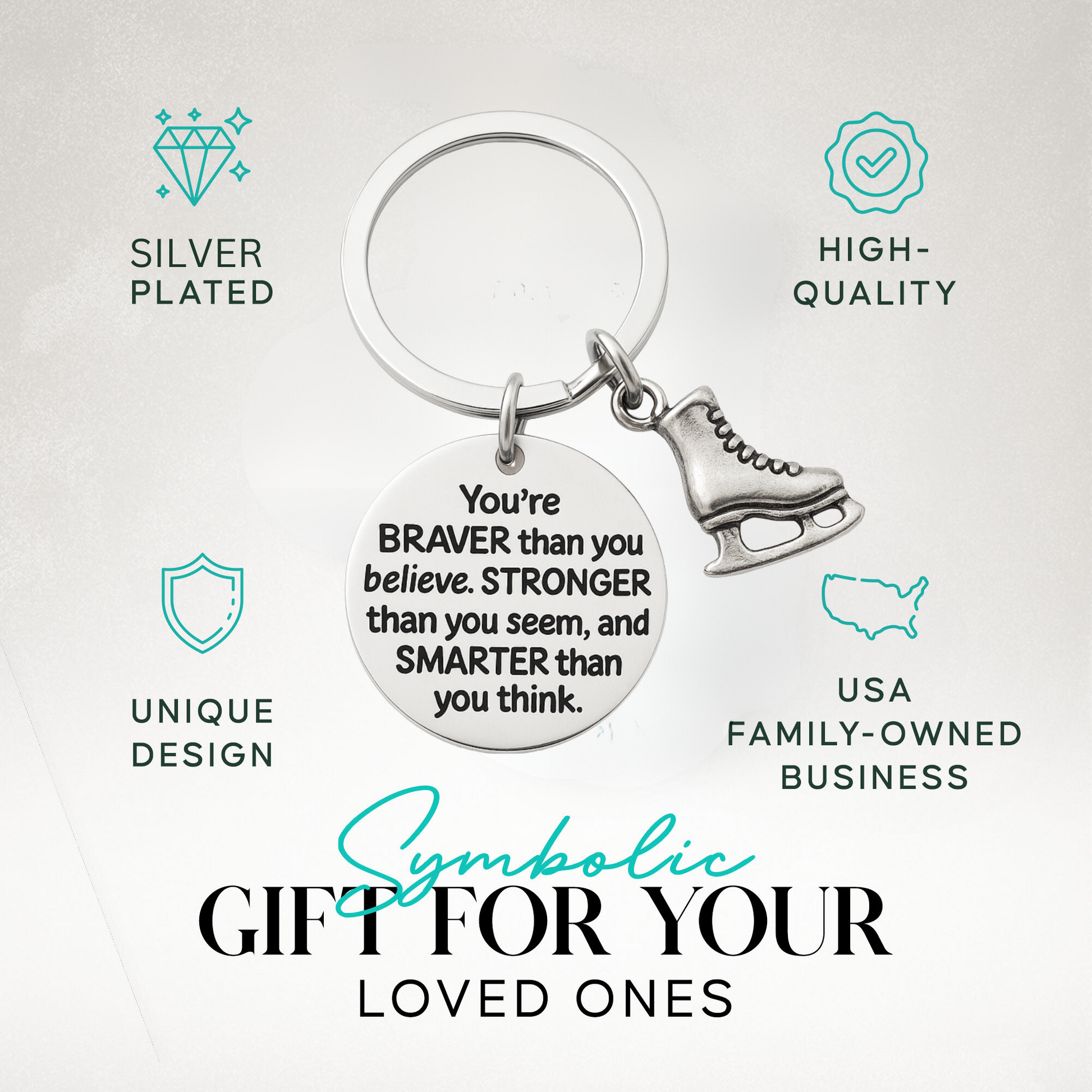 Inspirational figure skating keychain with engraved quote and skate charm displayed on neutral background