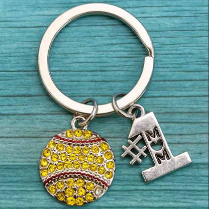 Softball themed keychain with crystal detail and mom charm on teal background, great for Mother’s Day or team gifts