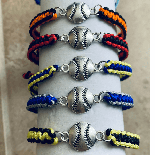 Colorful braided softball bracelets with silver charms, perfect softball jewelry and gifts for girls and teams.