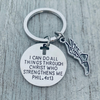 Inspirational running keychain with cross cutout, engraved scripture, and track wing charm for athletes