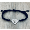 Graphic with black background displaying waterproof stainless steel martial arts bracelet with rust-proof text