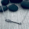 Stainless steel girls lacrosse charm necklace, tarnish-resistant and sporty