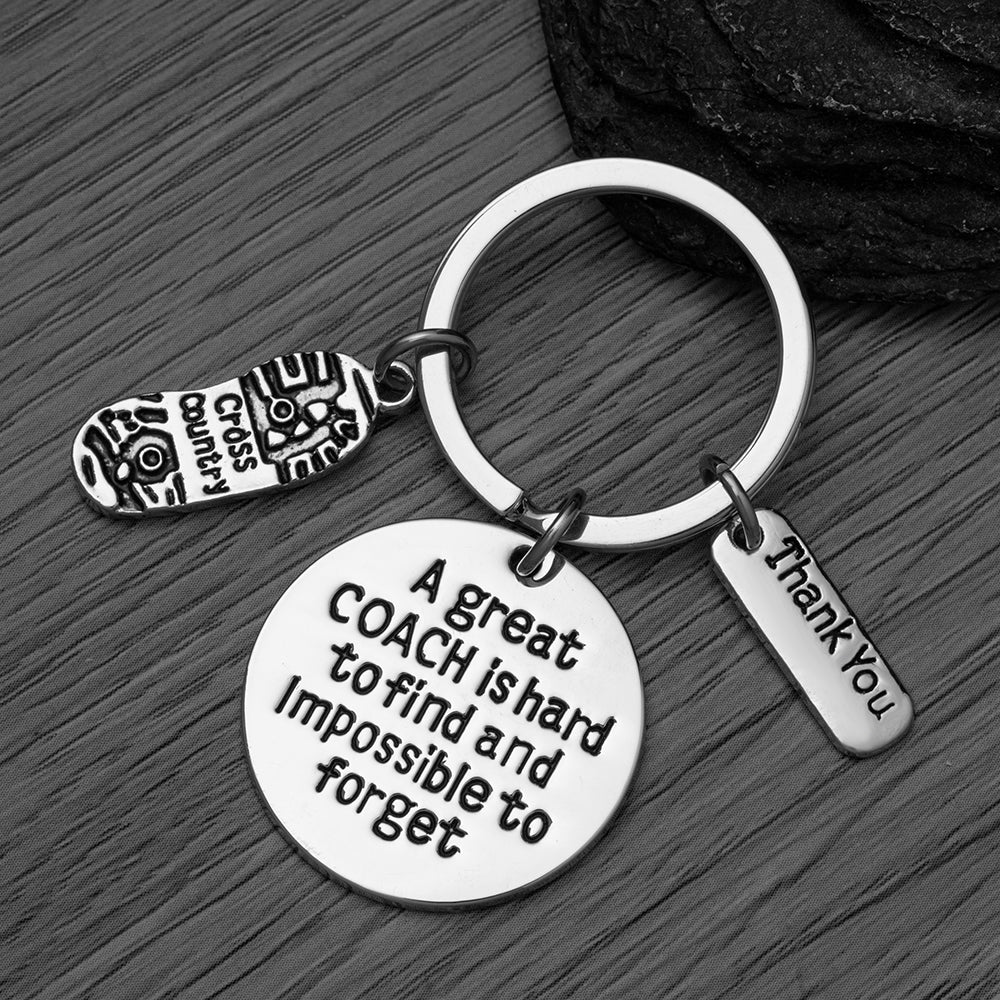Cross Country Coach is Hard to Find But Impossible to Forget Coach Keychain