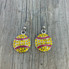 Softball-themed earrings in Sportybella gift pouch, ideal for birthdays, tournaments, or team accessories